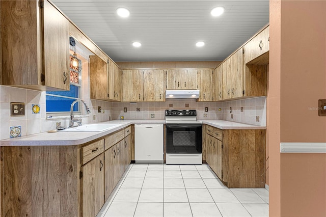 kitchen with light tile patterned floors, decorative backsplash, electric stove, dishwasher, and sink