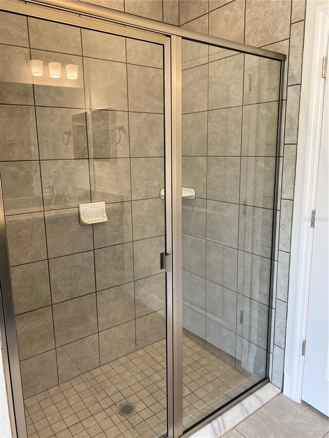 full bath featuring a stall shower