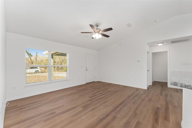 interior space featuring lofted ceiling, ceiling fan, and hardwood / wood-style floors