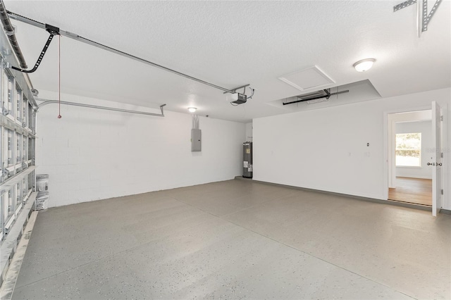 garage featuring a garage door opener, water heater, and electric panel