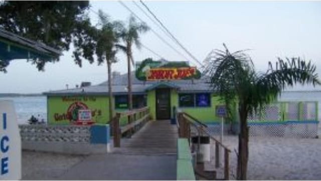 view of building exterior with a water view