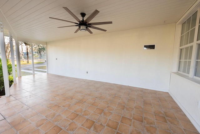 view of patio featuring ceiling fan