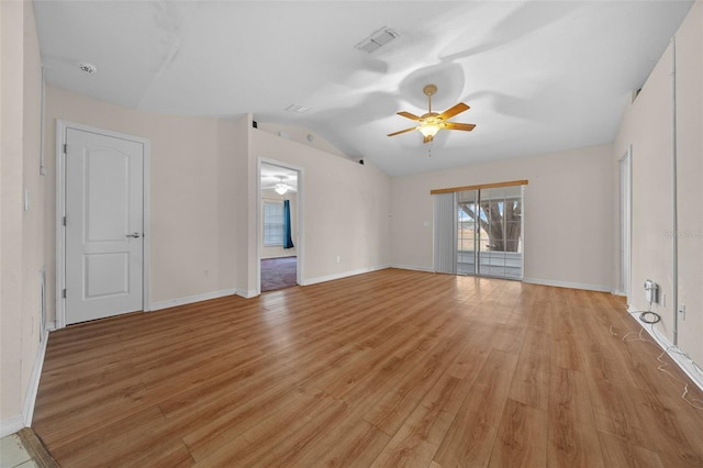 unfurnished room featuring lofted ceiling, ceiling fan, and light hardwood / wood-style floors