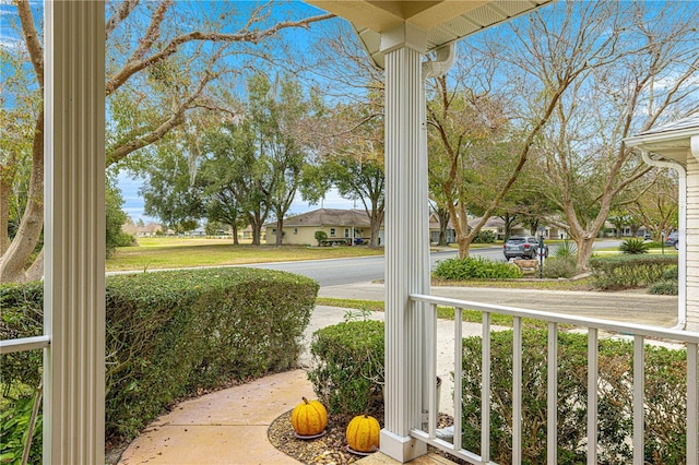 view of yard featuring covered porch