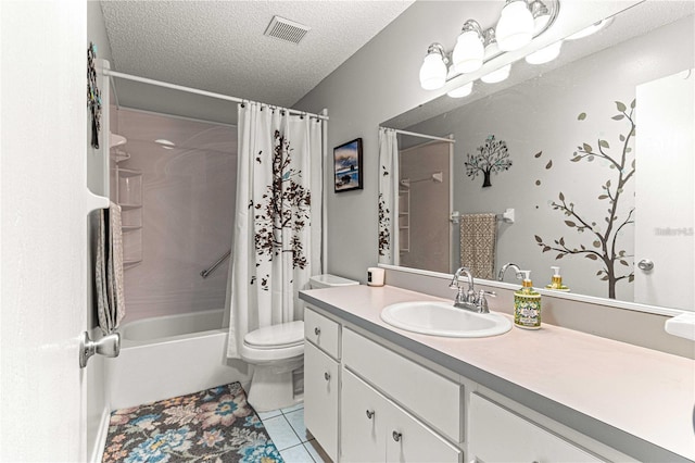 full bathroom featuring toilet, vanity, tile patterned flooring, shower / bath combo, and a textured ceiling