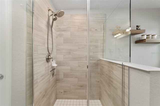 bathroom featuring a shower with door