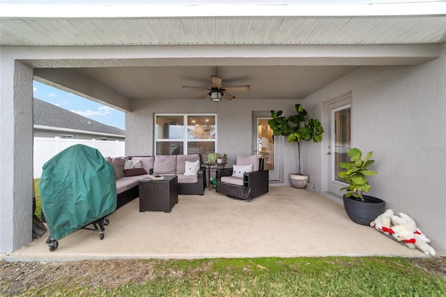 view of patio / terrace with ceiling fan and outdoor lounge area