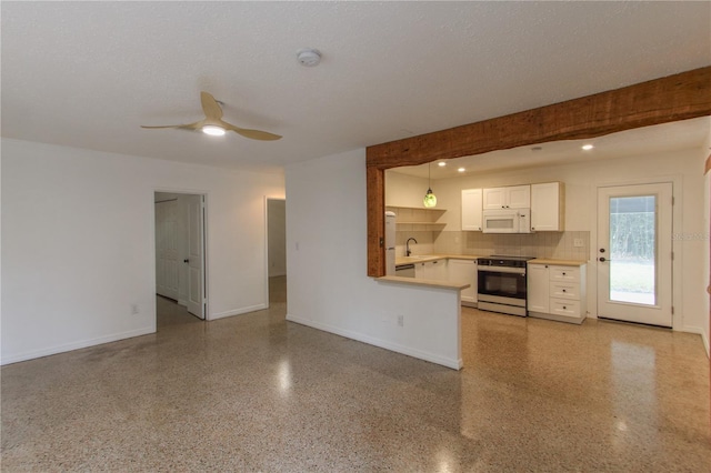 interior space with sink, a textured ceiling, and ceiling fan