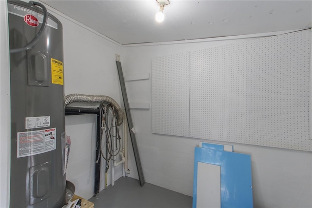 utility room with electric water heater