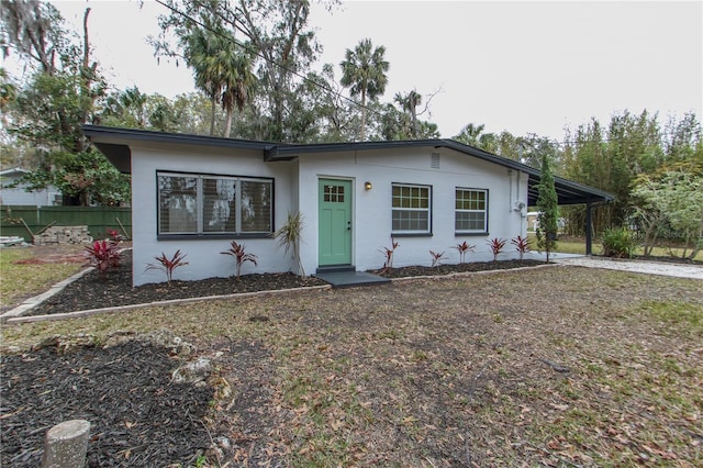 view of front of house featuring a carport