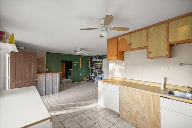 kitchen featuring sink and ceiling fan