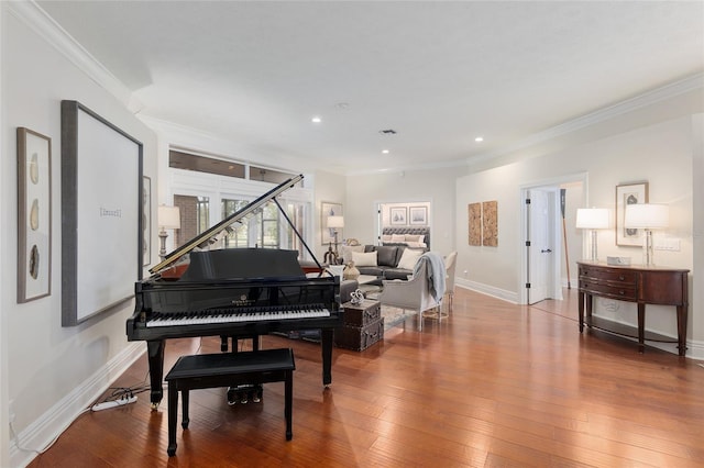 miscellaneous room featuring crown molding and wood-type flooring