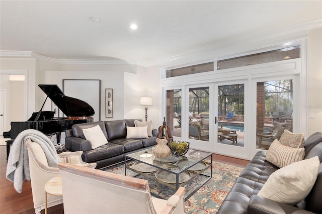 living room featuring ornamental molding, wood-type flooring, and french doors