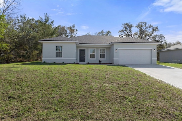 view of front of house featuring a front yard and a garage