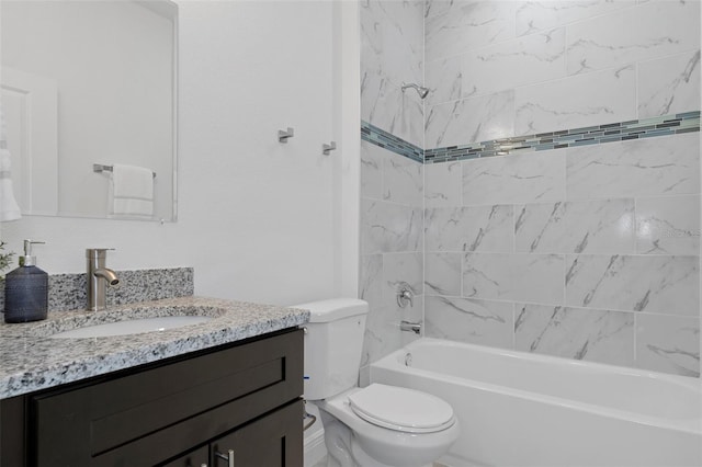 full bathroom with tiled shower / bath combo, vanity, and toilet