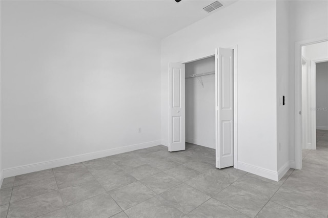 unfurnished bedroom featuring a closet