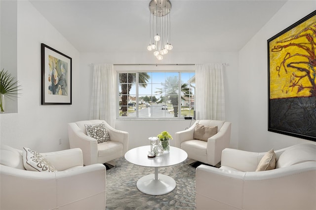 living room with a notable chandelier