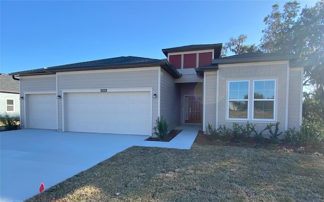 view of front of house with a garage