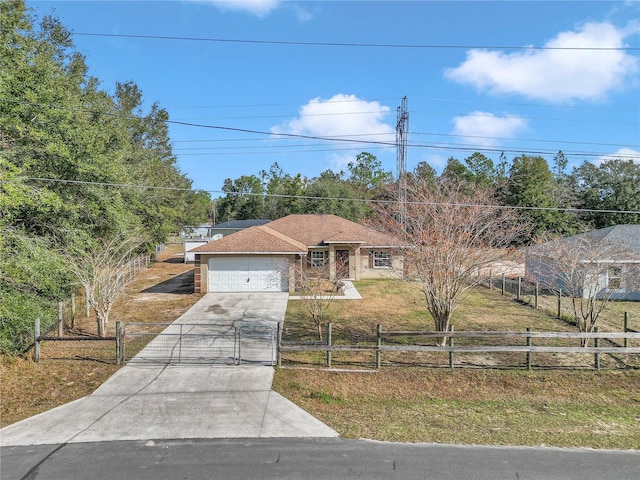 view of front facade featuring a garage and a front yard