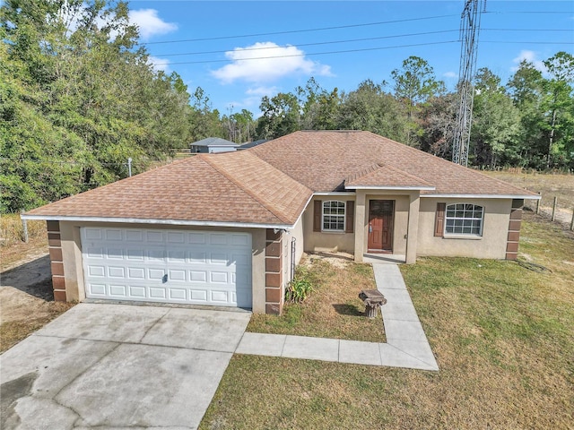 single story home featuring a front yard and a garage