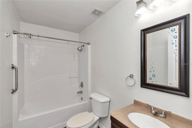 full bathroom with toilet, vanity, and shower / washtub combination