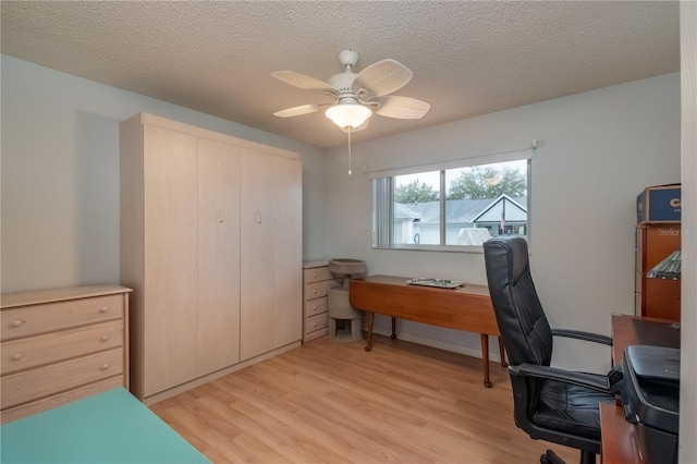 9051 SW 96th Ln Unit B, Ocala, FL 34481 - office with light wood finished floors, ceiling fan, and a textured ceiling