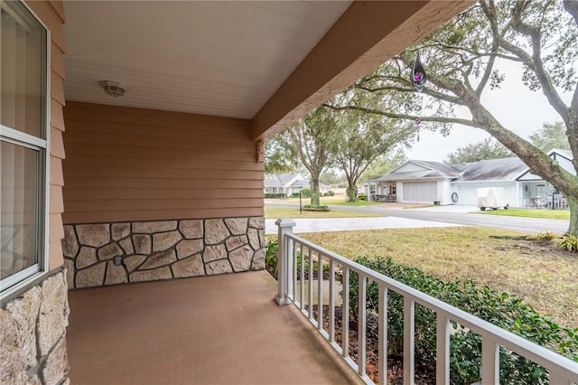 9051 SW 96th Ln Unit B, Ocala, FL 34481 - balcony featuring a porch and a residential view
