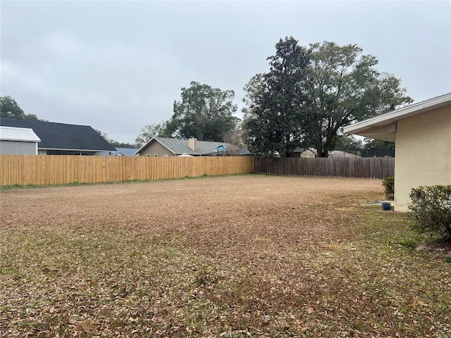 view of yard with fence