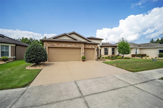 view of front facade with a front lawn and a garage