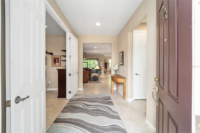 foyer entrance featuring light tile patterned floors