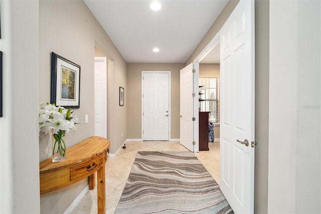 interior space with light tile patterned floors