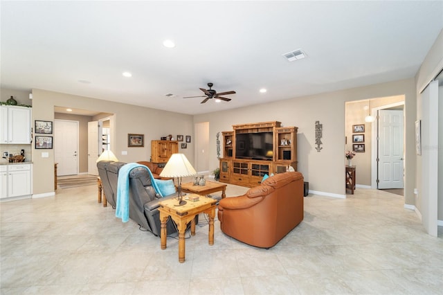 living room featuring ceiling fan