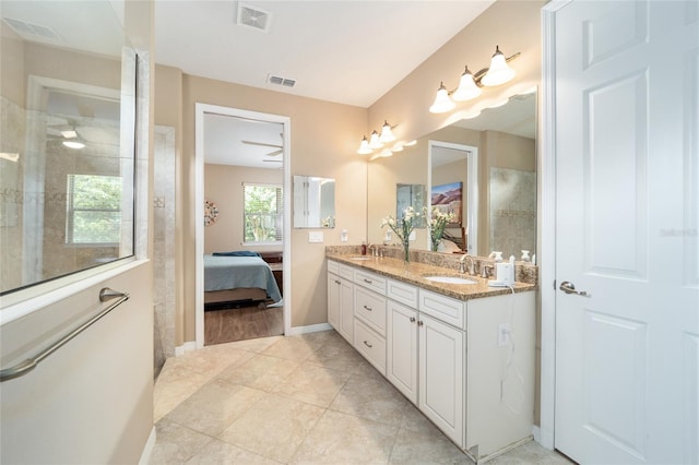 bathroom with vanity and tile patterned flooring