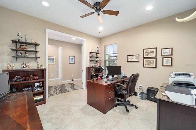 office space with ceiling fan and light tile patterned floors