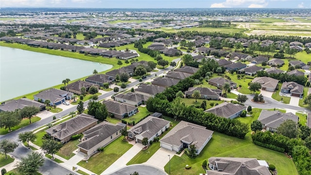 drone / aerial view featuring a water view