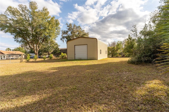 view of yard with a garage