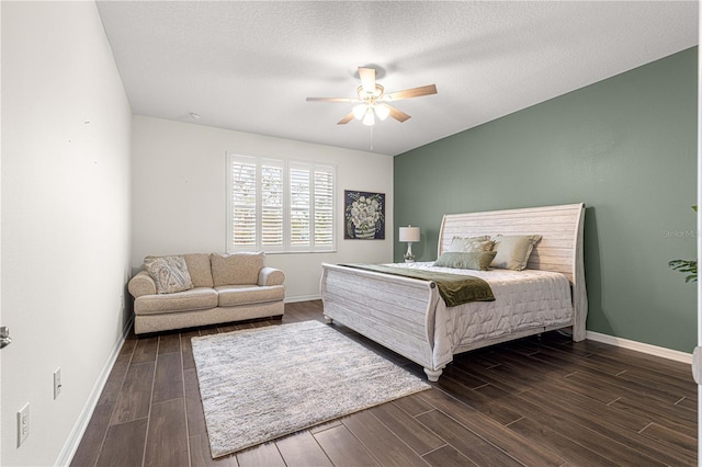 bedroom with a textured ceiling and ceiling fan