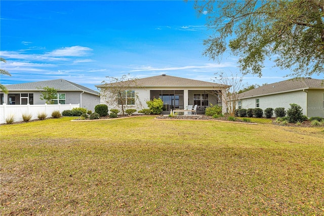 view of front of property with a front lawn