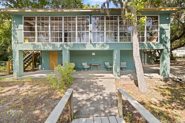 back of house with a patio area