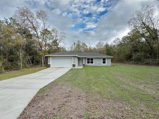 ranch-style home featuring stucco siding, an attached garage, driveway, and a front lawn