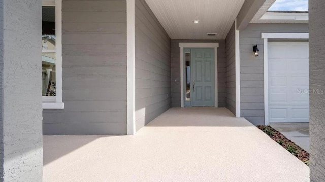 entrance to property with a garage