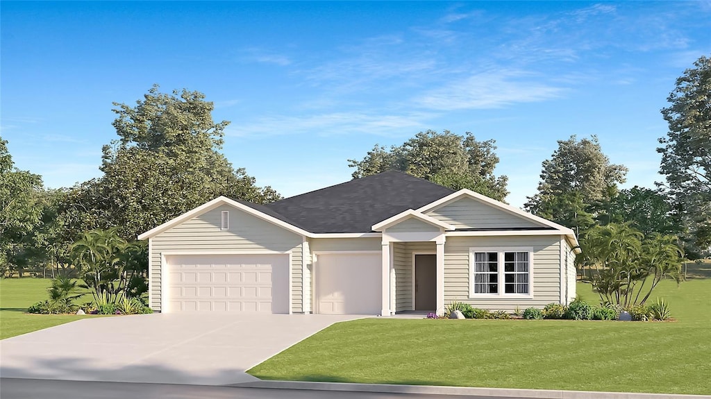 view of front of property with a front yard and a garage