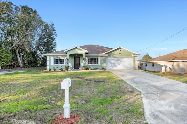 single story home with a garage and a front lawn