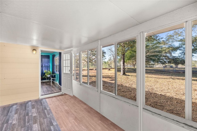 unfurnished sunroom with a healthy amount of sunlight