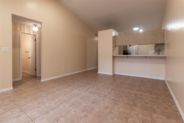 10918 SE 50th Ave, Belleview, FL 34420 - unfurnished living room featuring lofted ceiling