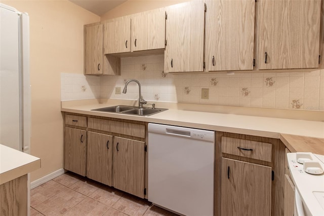 10918 SE 50th Ave, Belleview, FL 34420 - kitchen with dishwasher, light brown cabinets, tasteful backsplash, sink, and light tile patterned floors