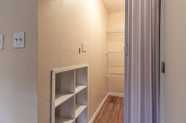10918 SE 50th Ave, Belleview, FL 34420 - spacious closet featuring hardwood / wood-style flooring