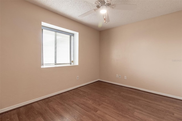10918 SE 50th Ave, Belleview, FL 34420 - empty room with a textured ceiling, ceiling fan, and dark hardwood / wood-style floors