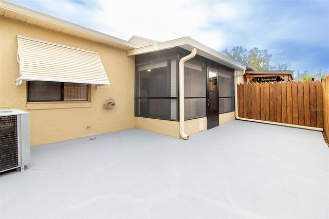 10918 SE 50th Ave, Belleview, FL 34420 - exterior space featuring central air condition unit and a patio area