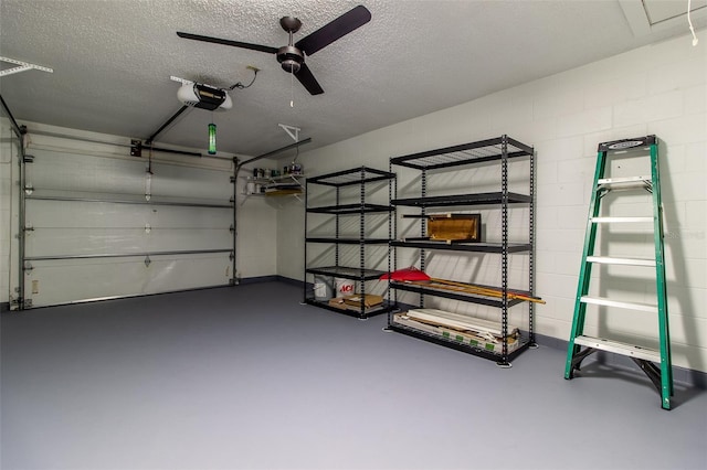10918 SE 50th Ave, Belleview, FL 34420 - garage featuring ceiling fan and a garage door opener